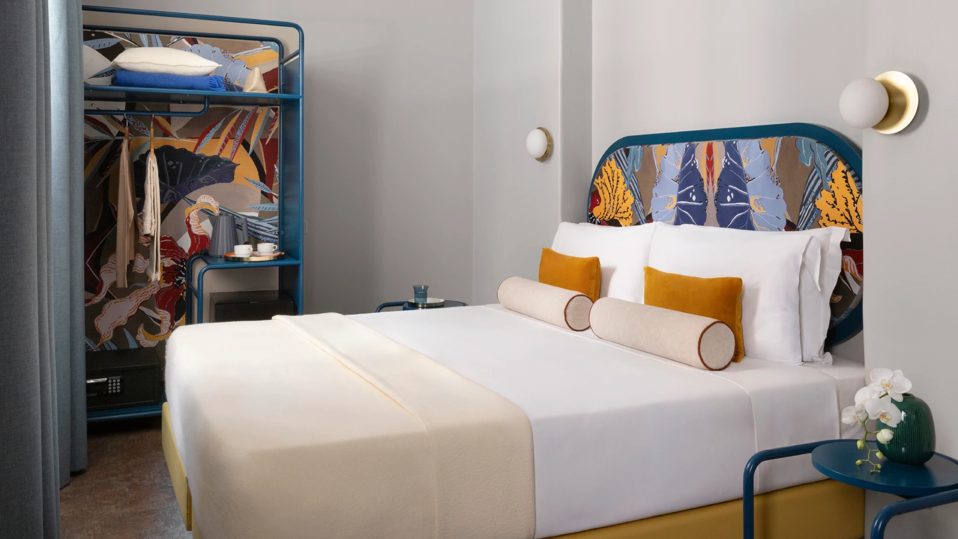 Double room with decorative headboard, colorful furnishings and seating area - Hotel XX Settembre, BZAR hotels in Rome