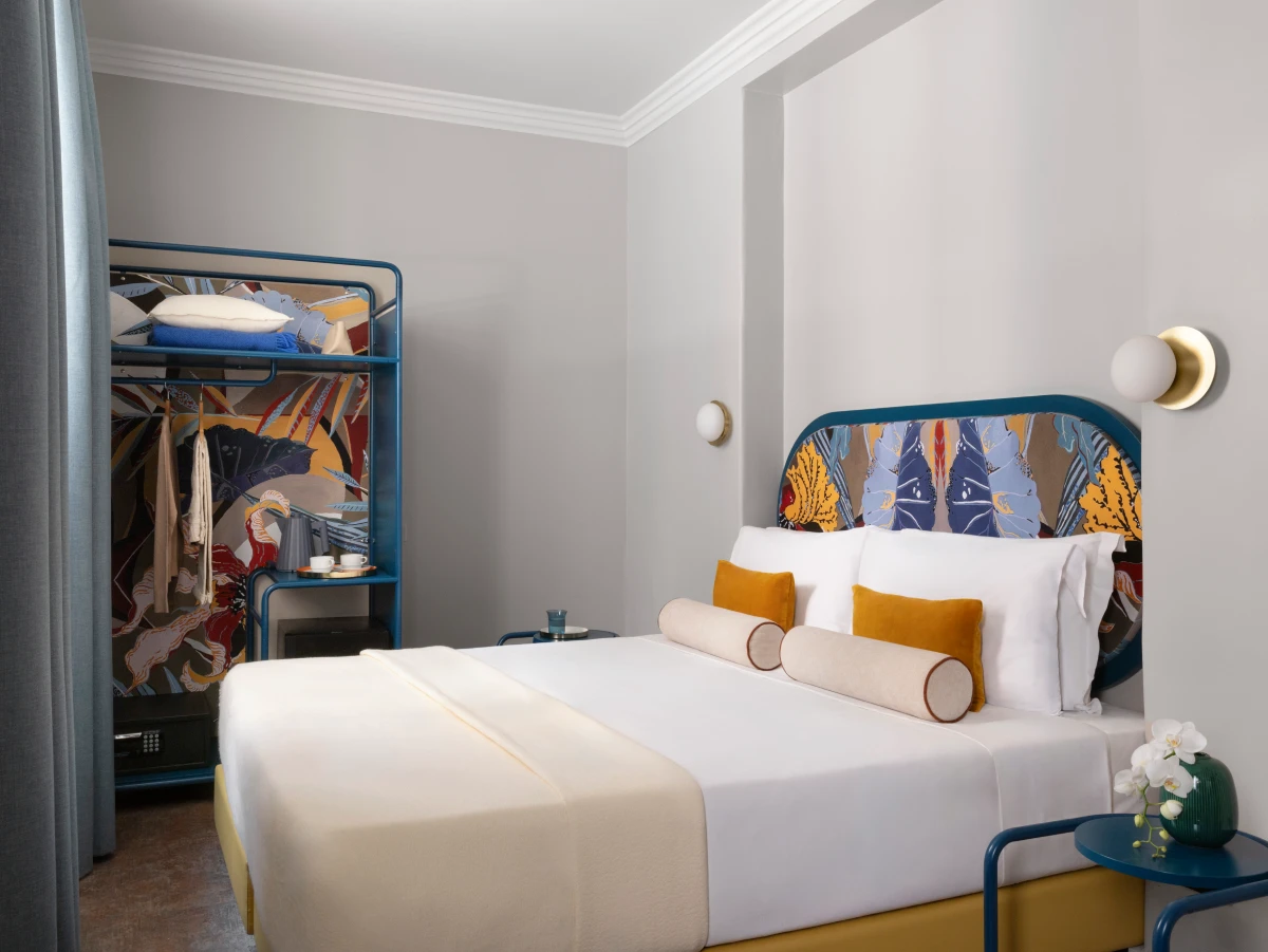 Standard room with double bed, decorative headboard and blue-toned furnishings - Hotel XX Settembre, BZAR hotels in Rome