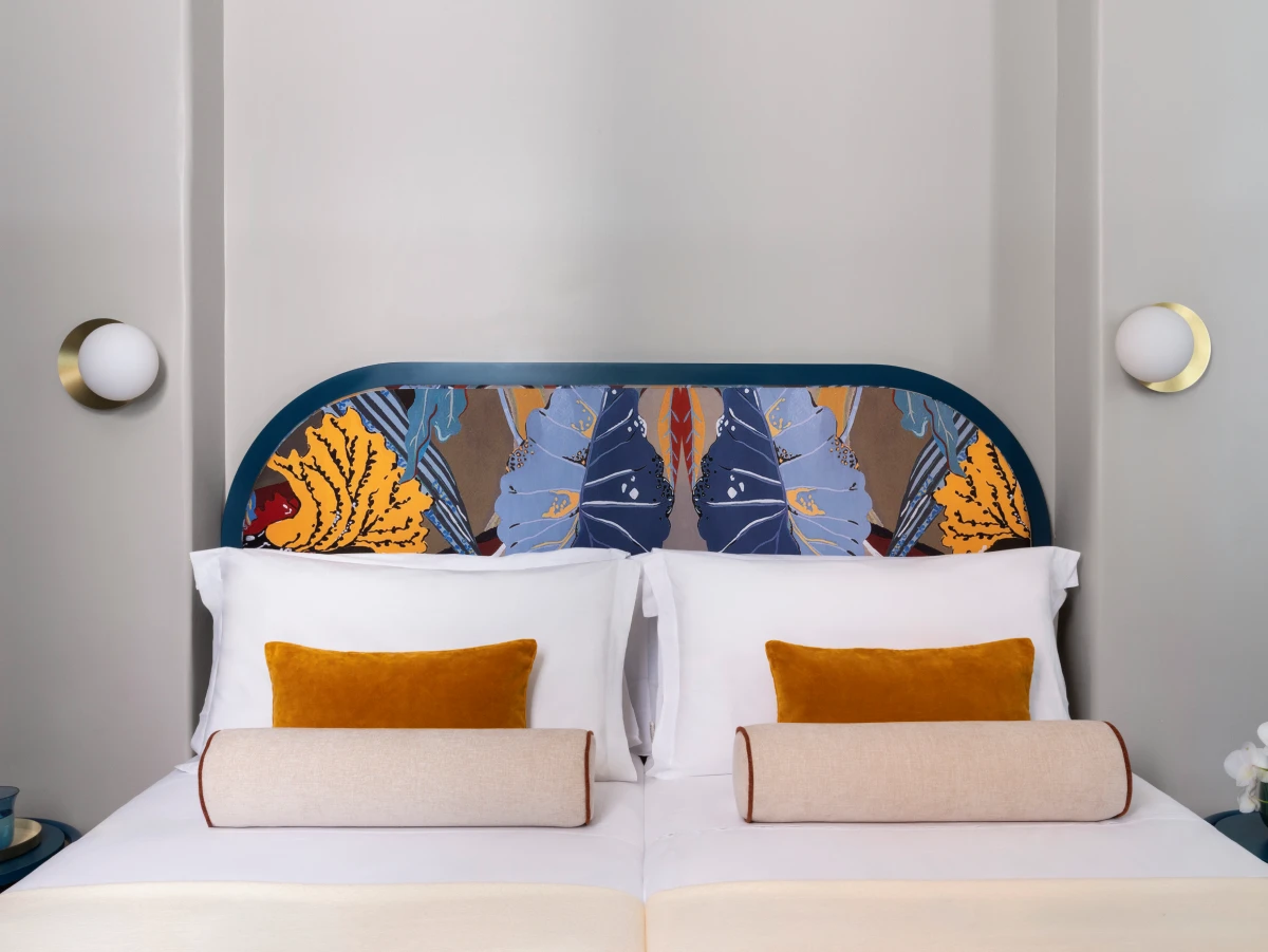 Double bed with decorative headboard and wall lighting - Hotel XX Settembre, BZAR hotels in Rome
